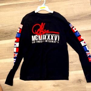 Black with sleeves and on the sleeves different types of flags